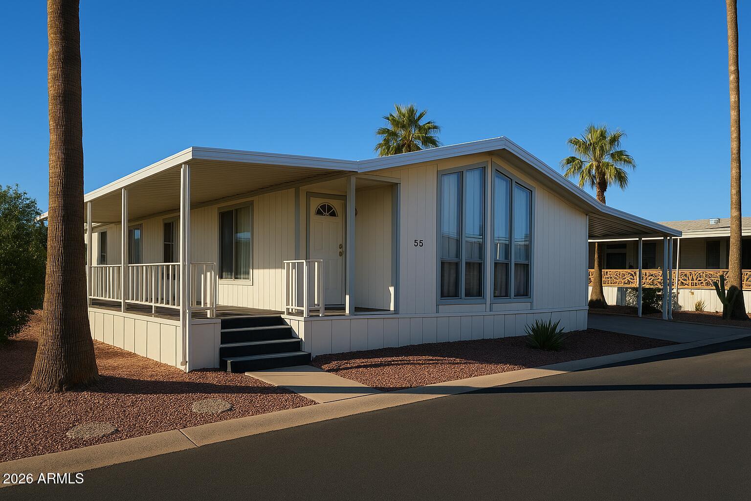 8600 East Broadway Road, Unit 55 Mesa, AZ 85208 - Photo 14 of 14 a front view of a house with a yard