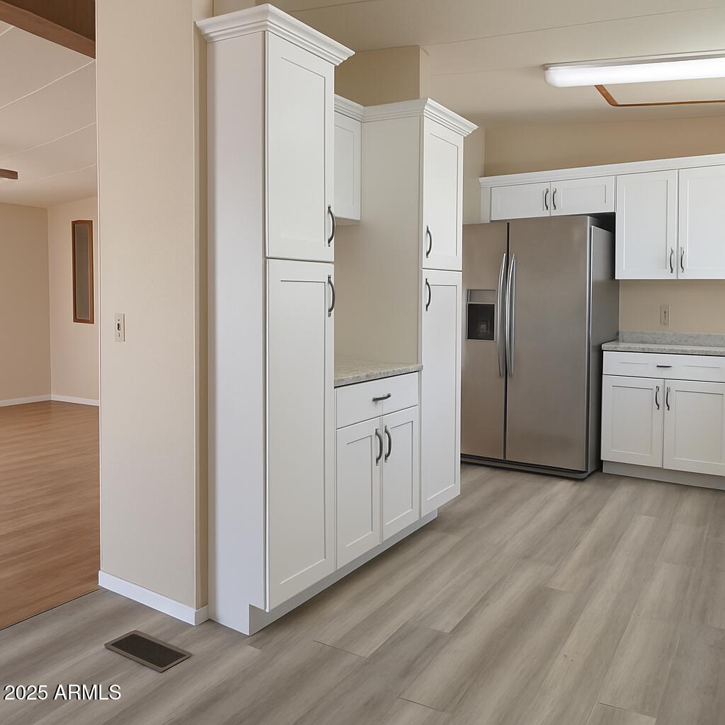8600 East Broadway Road, Unit 55 Mesa, AZ 85208 - Photo 4 of 14 a kitchen with stainless steel appliances a refrigerator and a stove top oven