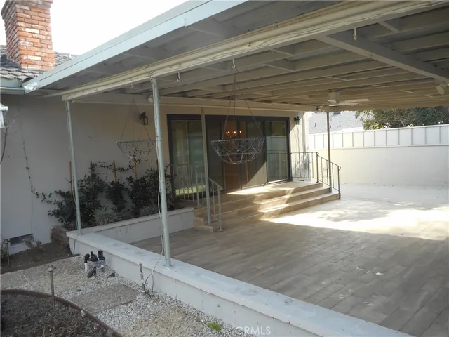 a front view of a building with an outdoor space