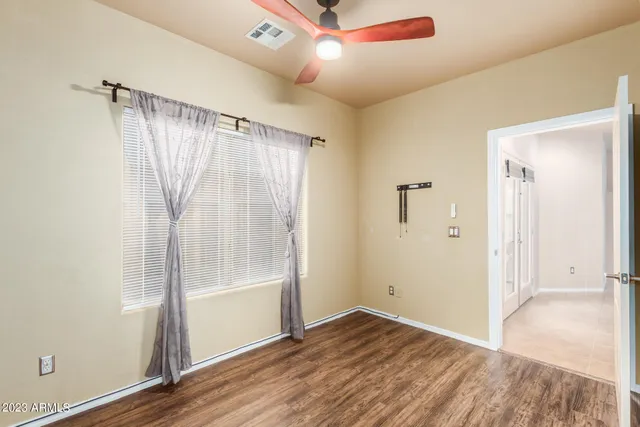 a bathroom with a double vanity sink and mirror