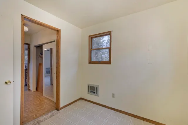a view of a hallway with closet area
