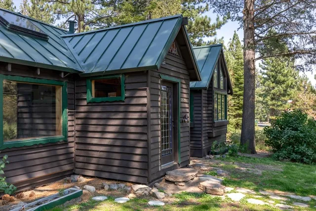 a backyard of a house with seating space