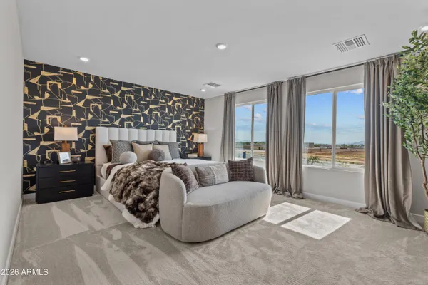 a bed room with a bed and a large window