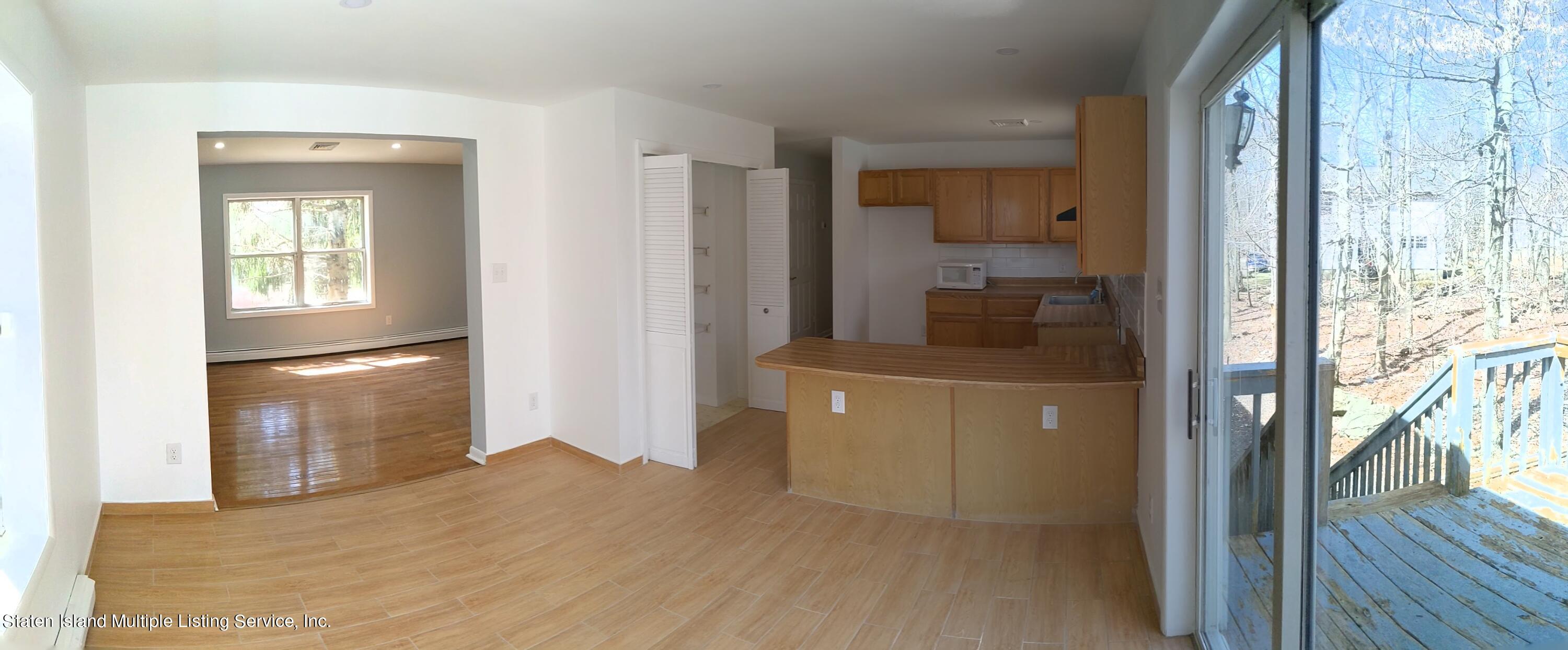 7609 Sawmill Road Pocono Lake, PA 18347 - Photo 21 of 47 a bathroom with a sink and a mirror