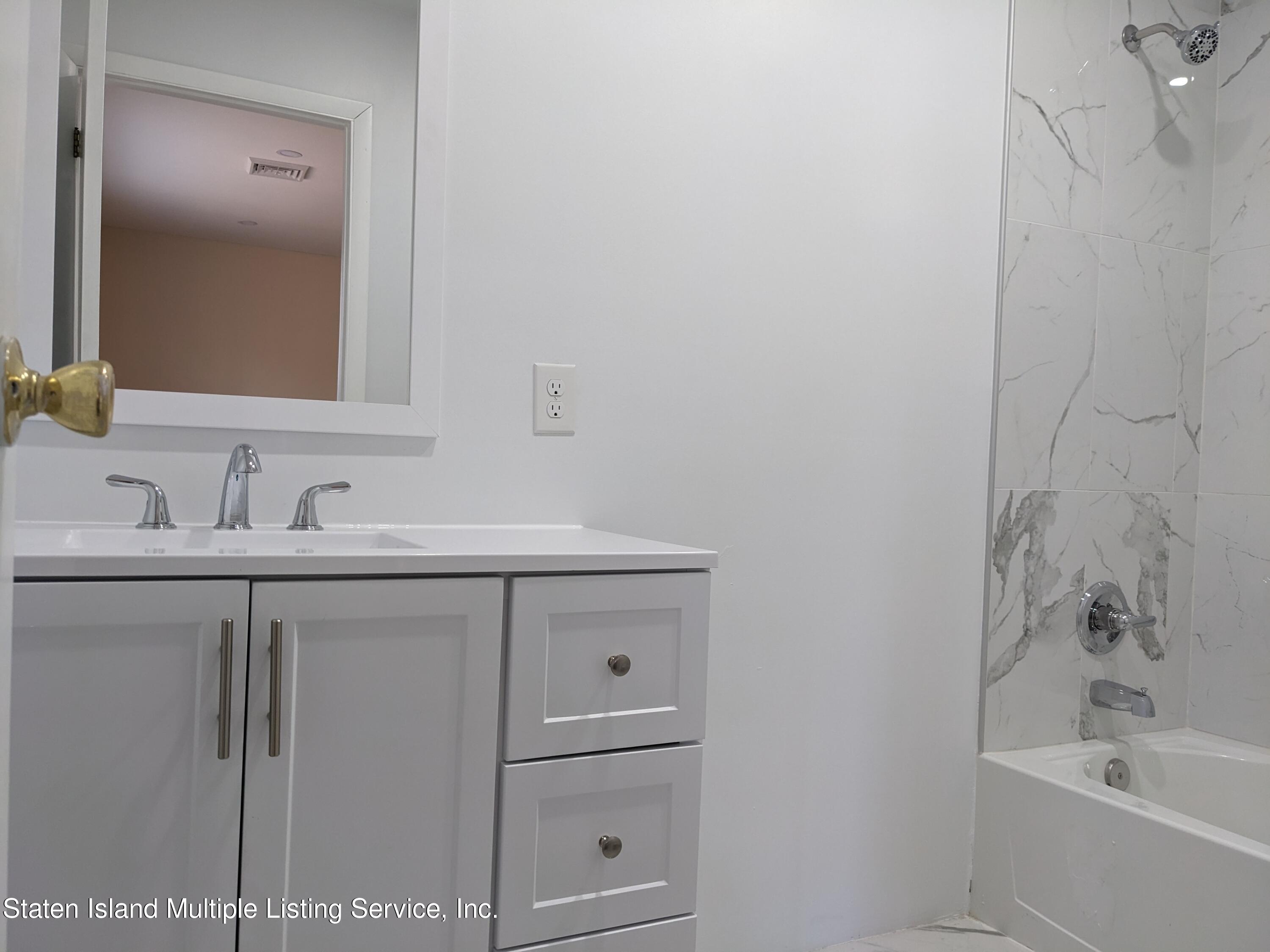 7609 Sawmill Road Pocono Lake, PA 18347 - Photo 26 of 47 a bathroom with a sink and a bathtub