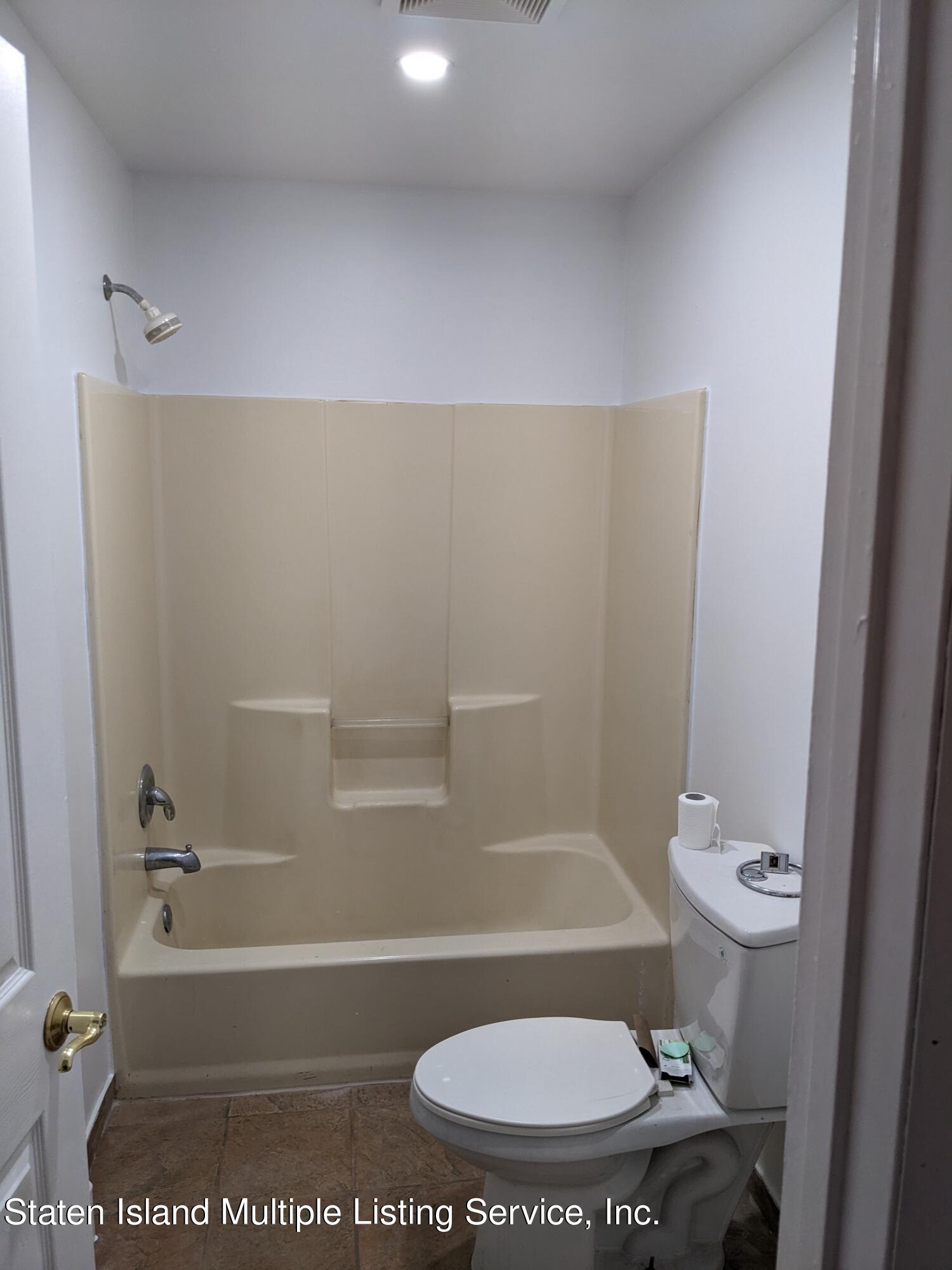 7609 Sawmill Road Pocono Lake, PA 18347 - Photo 30 of 47 a bathroom with a toilet and a shower