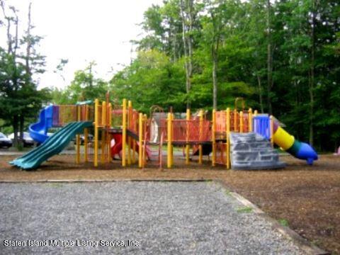 7609 Sawmill Road Pocono Lake, PA 18347 - Photo 38 of 47 a view of outdoor space with trampoline