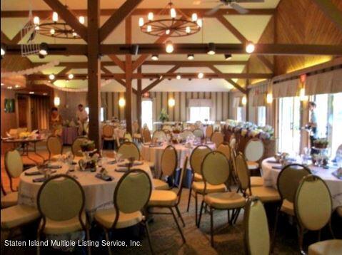 7609 Sawmill Road Pocono Lake, PA 18347 - Photo 39 of 47 a room with lots of chairs and mirrors