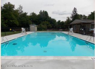 7609 Sawmill Road Pocono Lake, PA 18347 - Photo 41 of 47 a view of backyard with swimming pool and furniture
