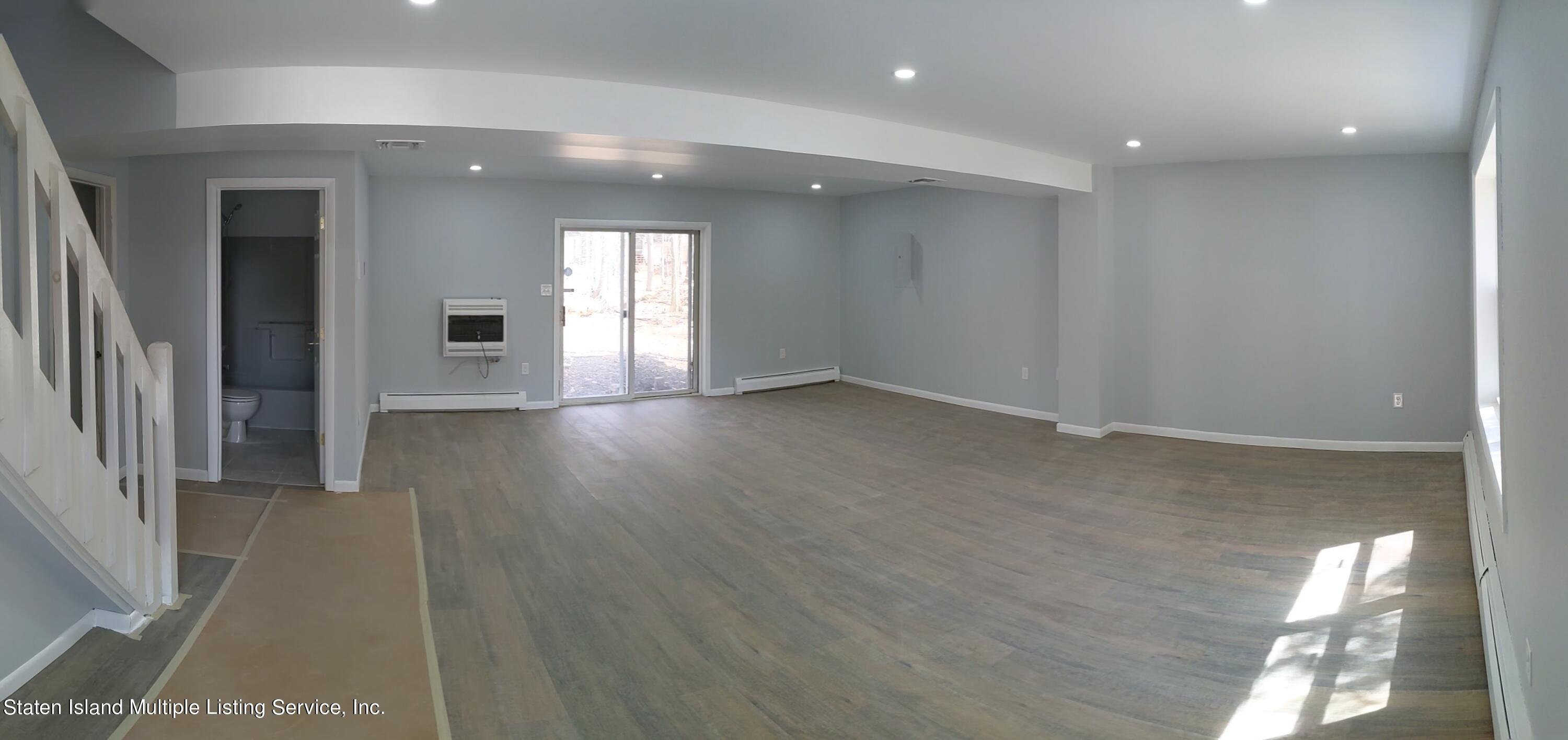 7609 Sawmill Road Pocono Lake, PA 18347 - Photo 7 of 47 a view of hallway with a window