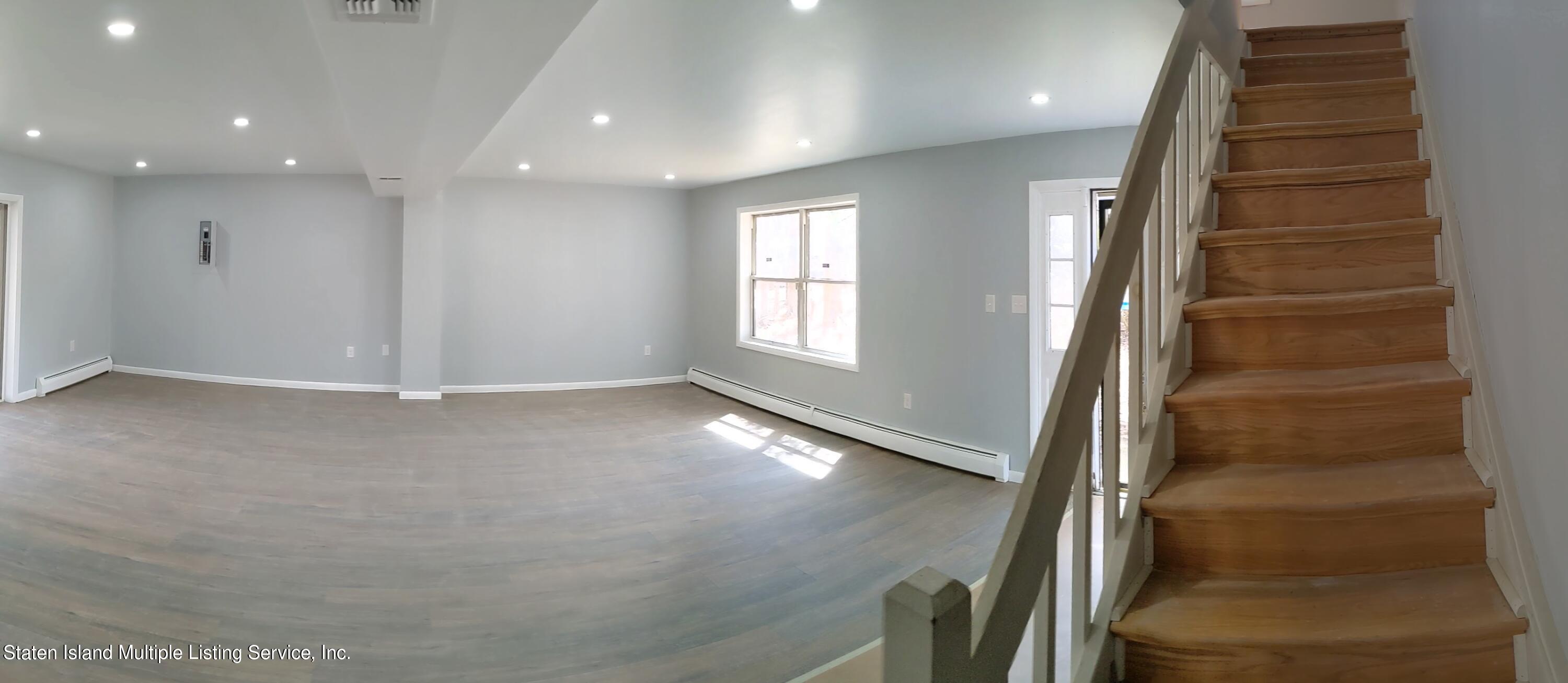 7609 Sawmill Road Pocono Lake, PA 18347 - Photo 8 of 47 a view of entryway and hall with wooden floor