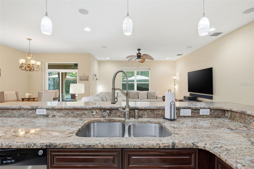979 Counts Crest Circle Apopka, FL 32712 - Photo 15 of 48 a view of kitchen with sink and living room