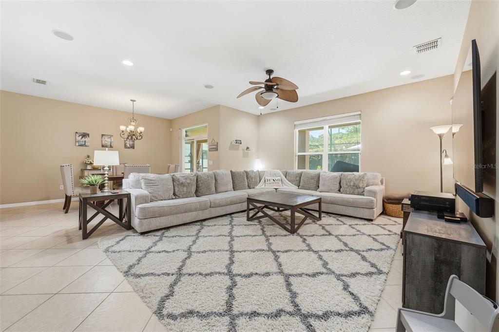 979 Counts Crest Circle Apopka, FL 32712 - Photo 17 of 48 a living room with furniture and a window