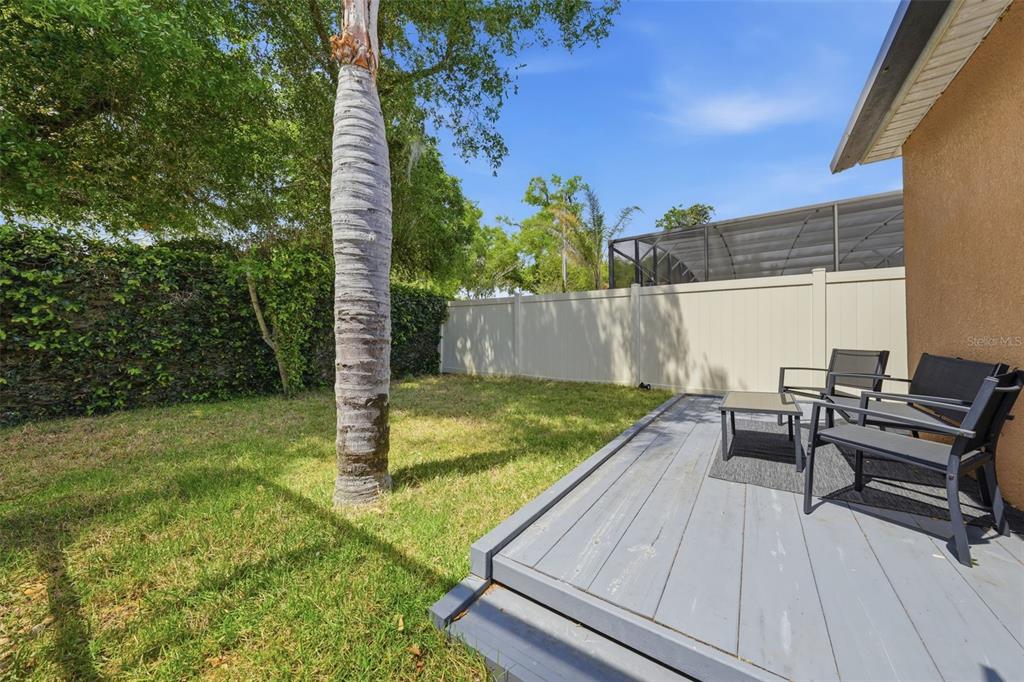 979 Counts Crest Circle Apopka, FL 32712 - Photo 35 of 48 a view of a backyard with sitting area