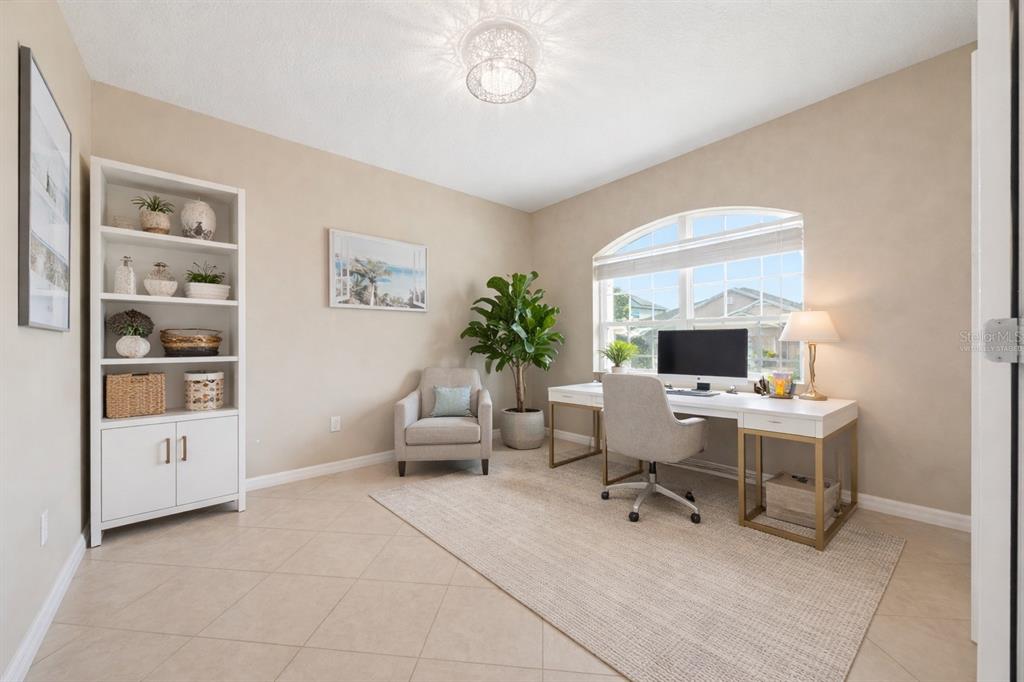 979 Counts Crest Circle Apopka, FL 32712 - Photo 6 of 48 a view of a workspace with furniture and a window
