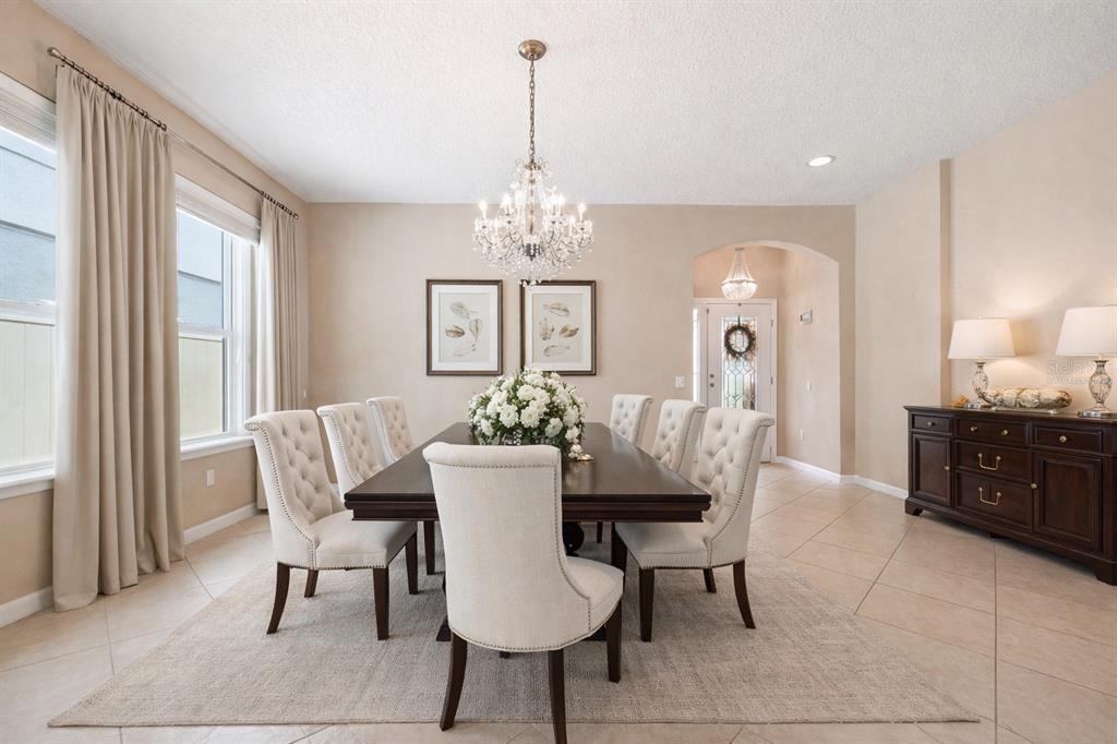 979 Counts Crest Circle Apopka, FL 32712 - Photo 8 of 48 a view of a dining room with furniture and window
