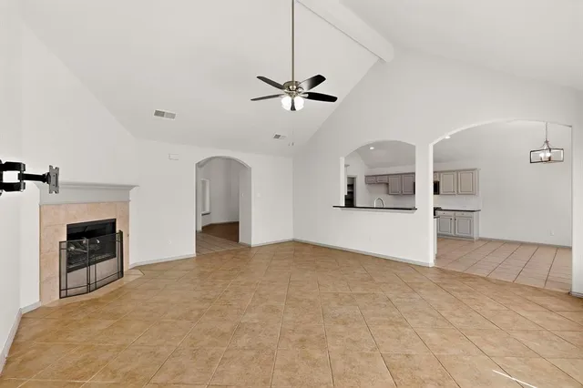 a view of a kitchen with furniture and a fireplace