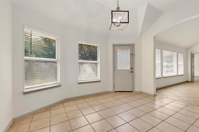 a view of an empty room with window