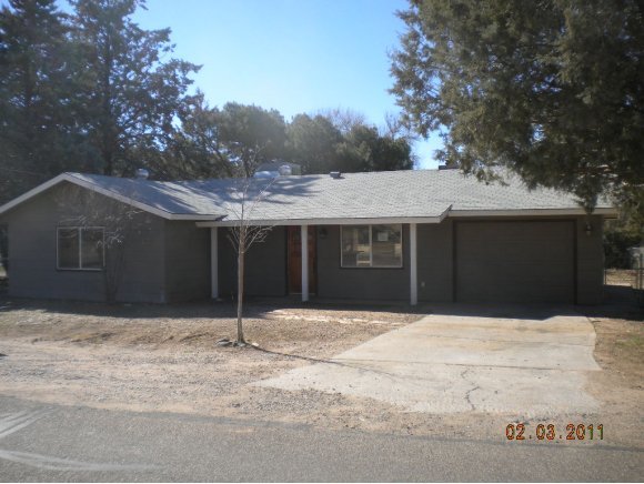 3715 East Rimrock Drive Rimrock, AZ 86335 - Photo 1 of 4 a house with trees in the background