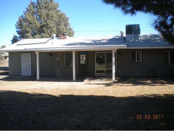 3715 East Rimrock Drive Rimrock, AZ 86335 - Photo 2 of 4 a view of a house with a yard