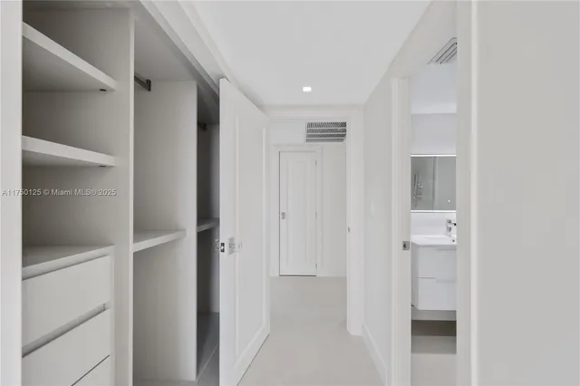 a bathroom with a shower and a toilet