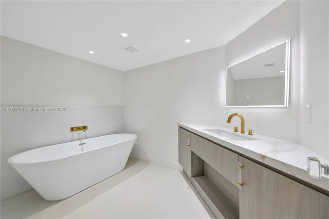 a view of an empty room with glass door