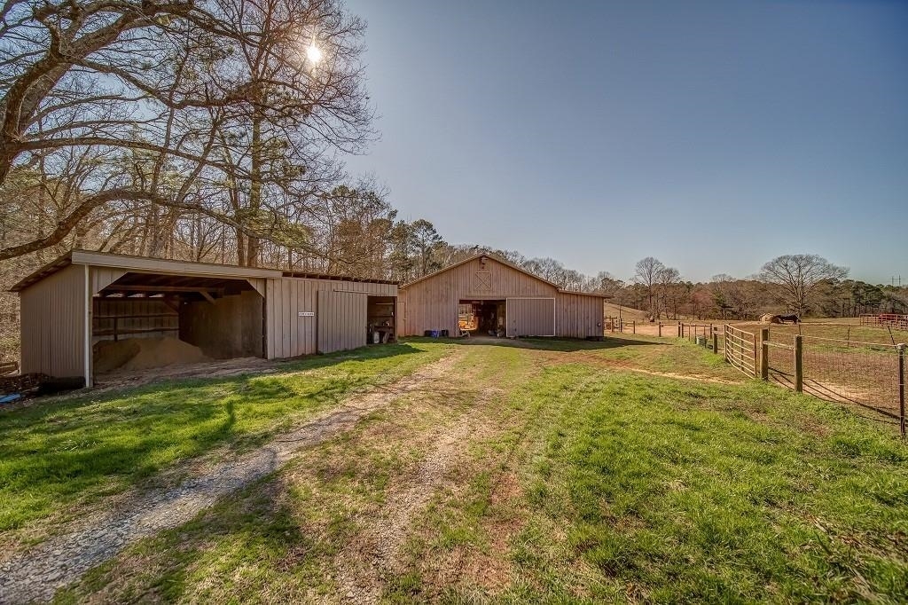2752 Ball Ground Road Ball Ground, GA 30107 - Photo 1 of 1 a house view with a outdoor space