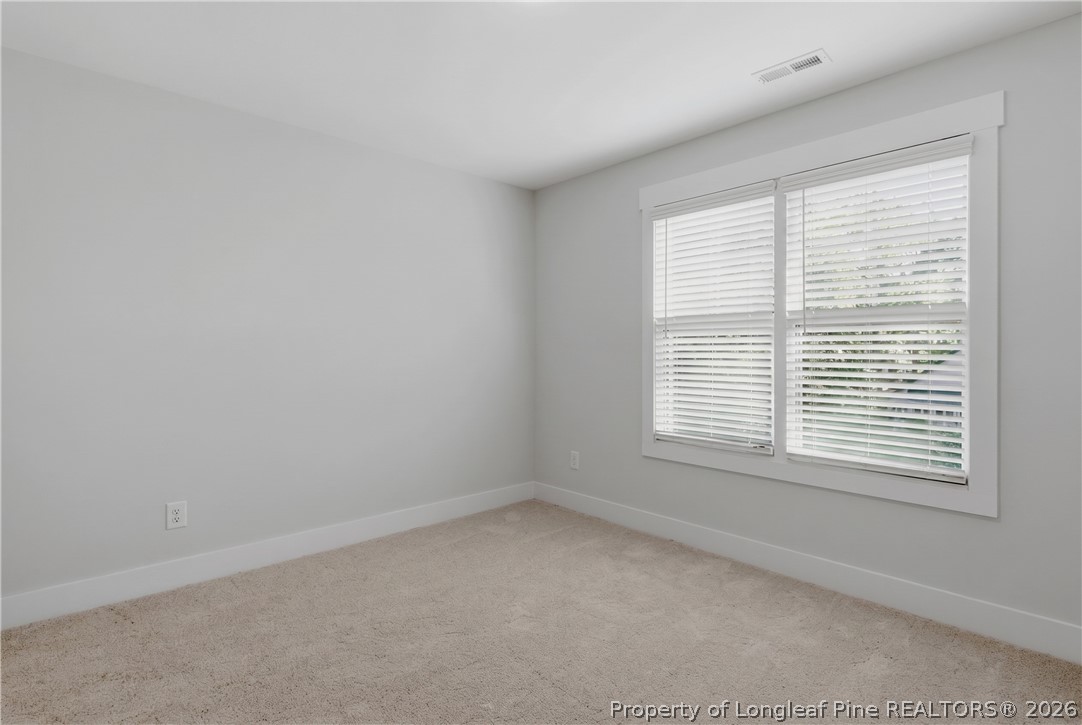3931 Hamilton Street Hope Mills, NC 28348 - Photo 40 of 50 a view of an empty room with a window