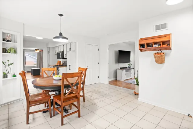 a view of a dining room with furniture