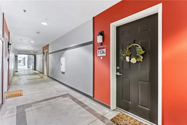 a view of street with tall buildings