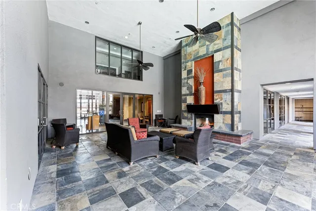 a bathroom with a window and a shower