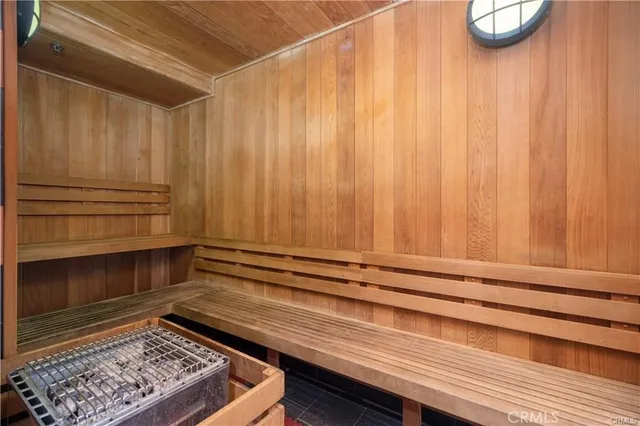 a view of a kitchen with wooden floor and a sink