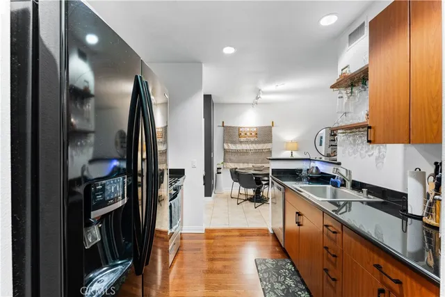 a living room with furniture a rug and a window