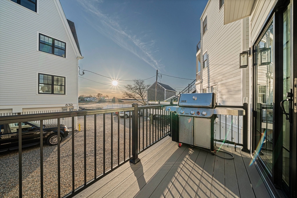 85 Glades Road Scituate, MA 02066 - Photo 12 of 42 a view of a balcony with wooden floor
