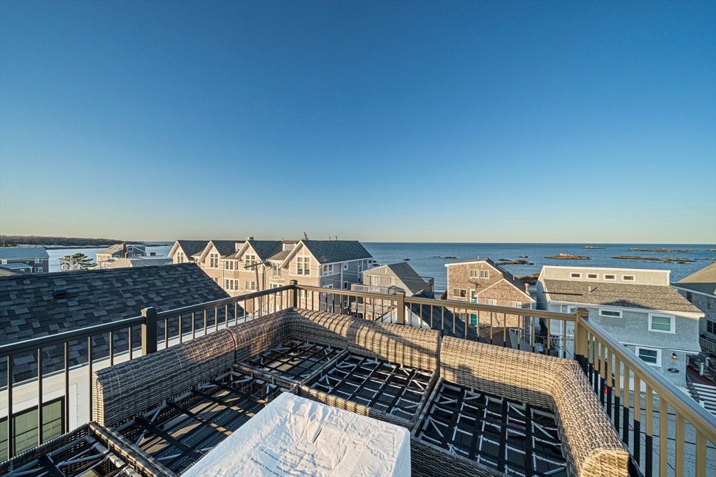 85 Glades Road Scituate, MA 02066 - Photo 28 of 42 a view of a balcony with wooden floor