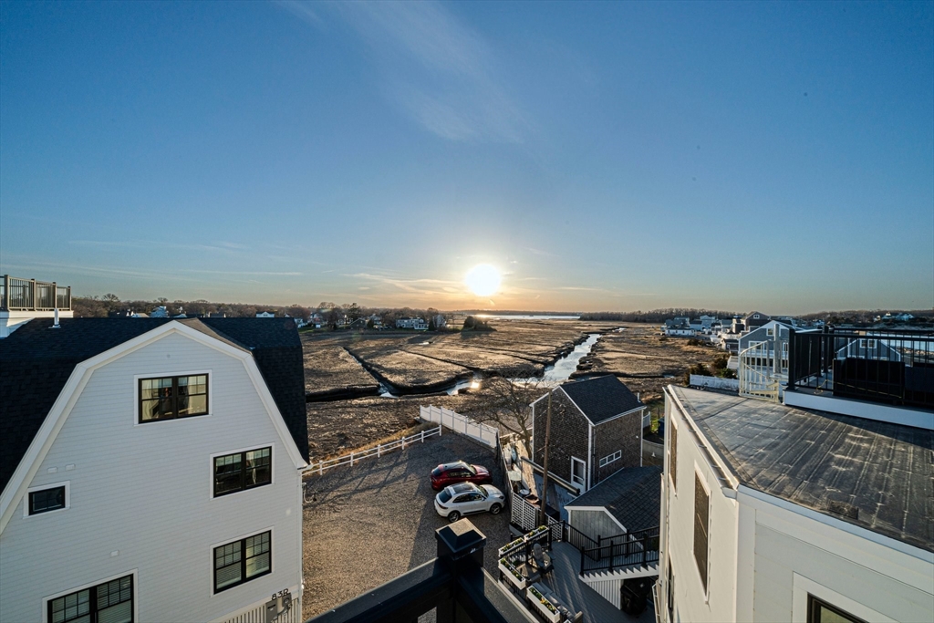 85 Glades Road Scituate, MA 02066 - Photo 35 of 42 an aerial view of a house with a yard