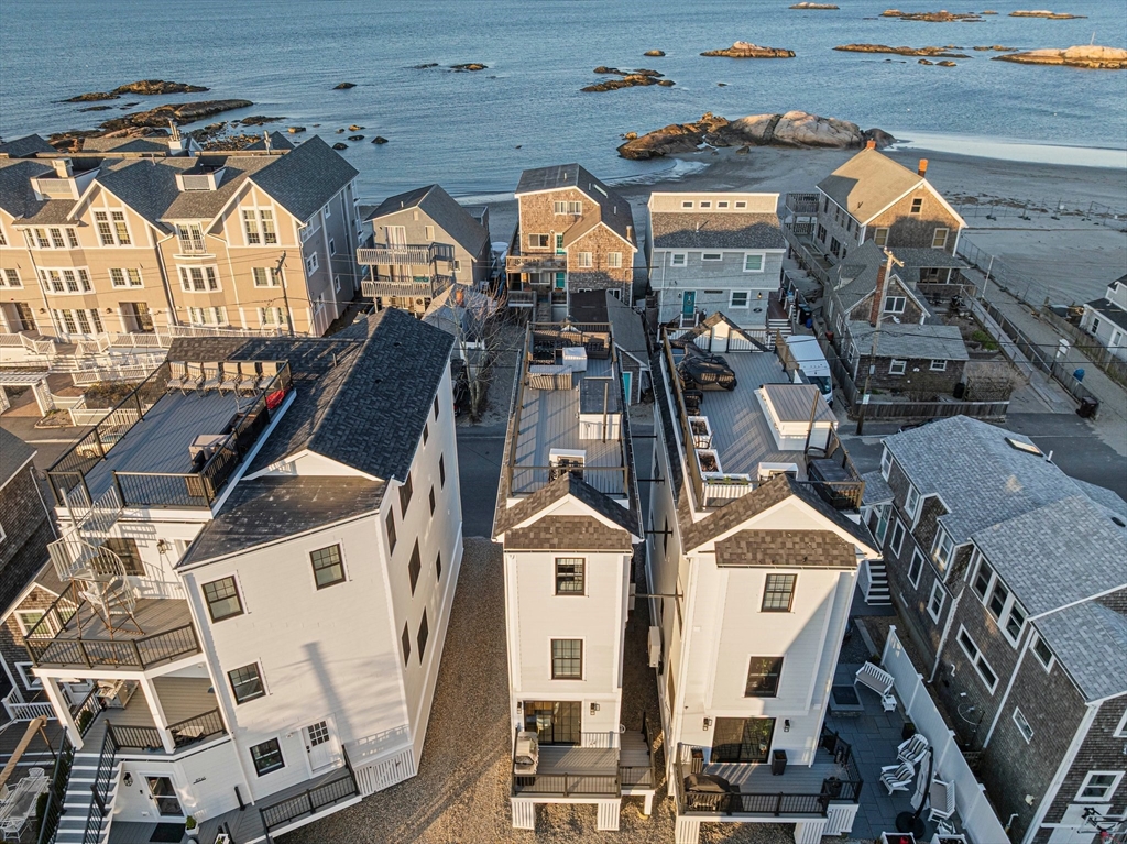 85 Glades Road Scituate, MA 02066 - Photo 36 of 42 a view of a large building with a clock on the wall