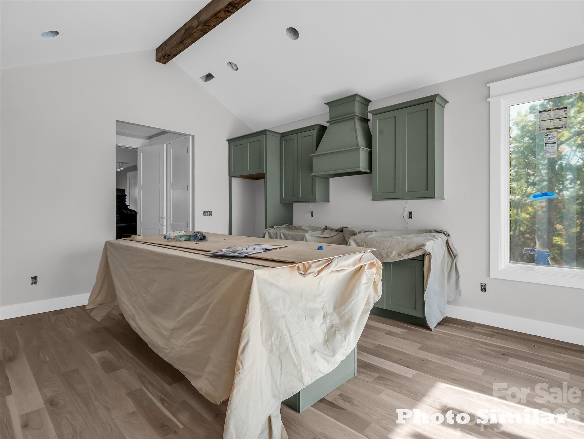 1 Jackson Ridge Ln Mill Spring Mill Spring, NC 28756 - Photo 12 of 43 a living room with a bed furniture and a window