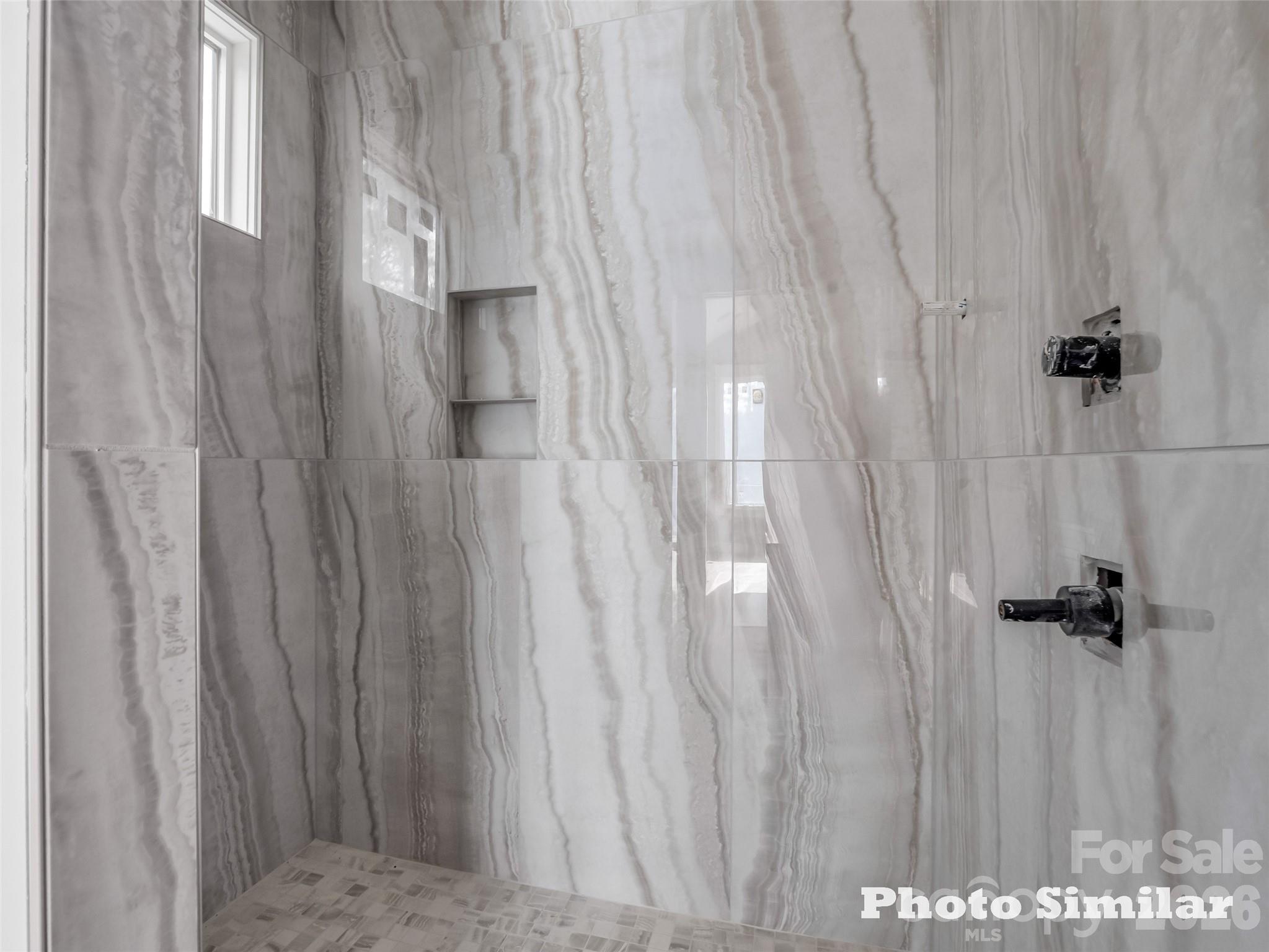 1 Jackson Ridge Ln Mill Spring Mill Spring, NC 28756 - Photo 21 of 43 a view of a bathroom with shower