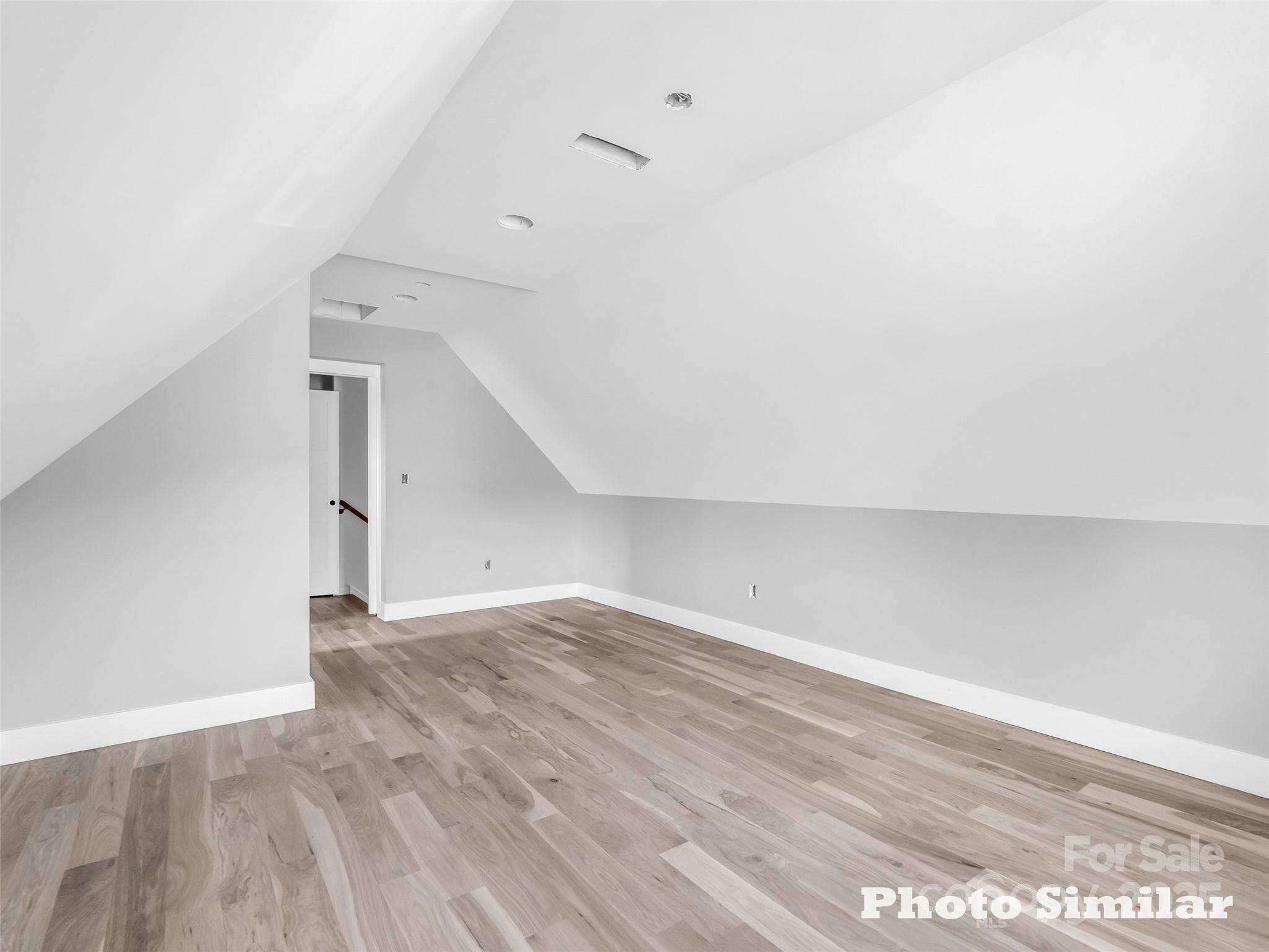 1 Jackson Ridge Ln Mill Spring Mill Spring, NC 28756 - Photo 26 of 36 a view of an empty room with wooden floor