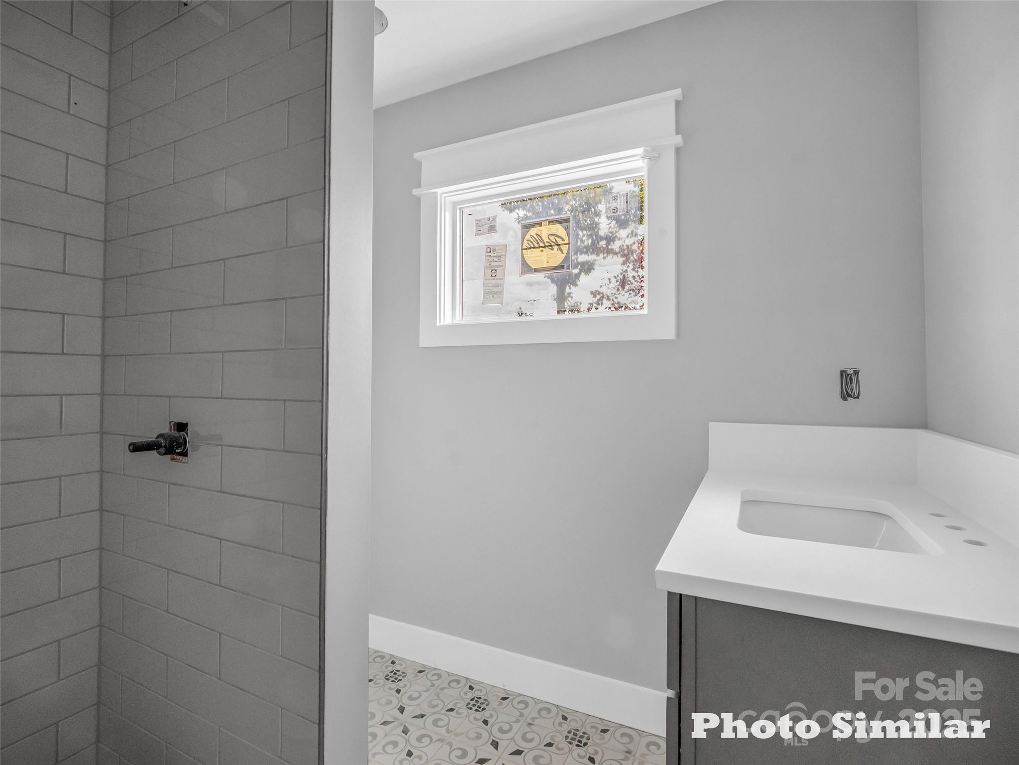 1 Jackson Ridge Ln Mill Spring Mill Spring, NC 28756 - Photo 27 of 36 a bathroom with a sink and bathtub
