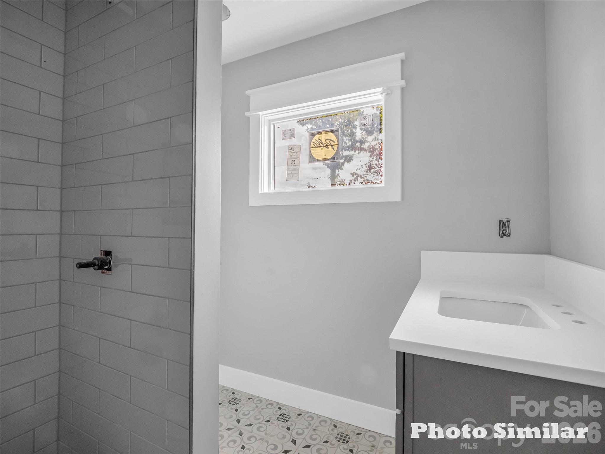 1 Jackson Ridge Ln Mill Spring Mill Spring, NC 28756 - Photo 27 of 43 a bathroom with a sink and bathtub
