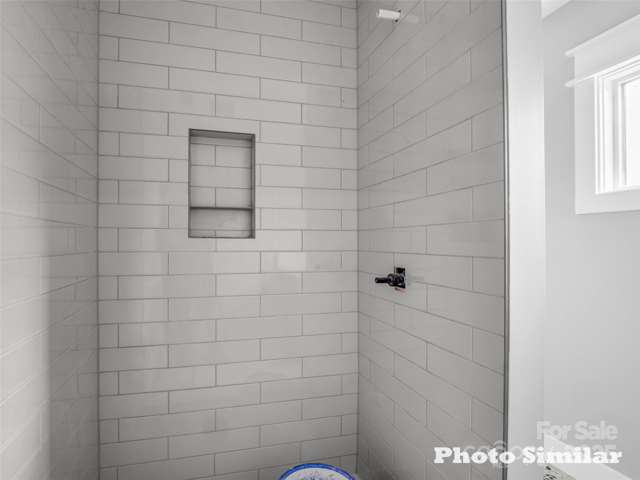 1 Jackson Ridge Ln Mill Spring Mill Spring, NC 28756 - Photo 28 of 36 a bathroom with a shower