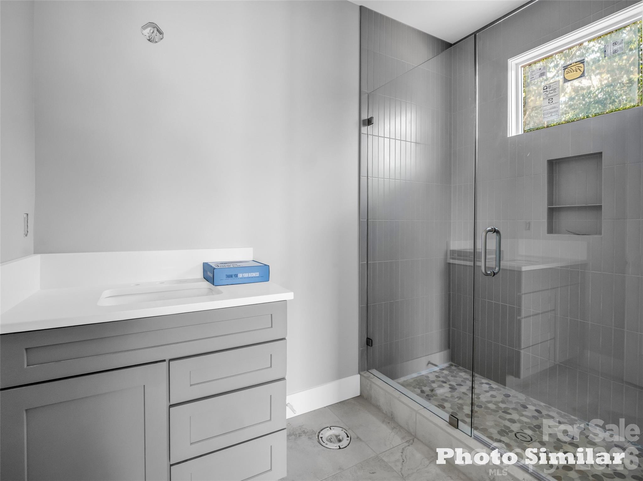 1 Jackson Ridge Ln Mill Spring Mill Spring, NC 28756 - Photo 31 of 43 a bathroom with a shower and sink