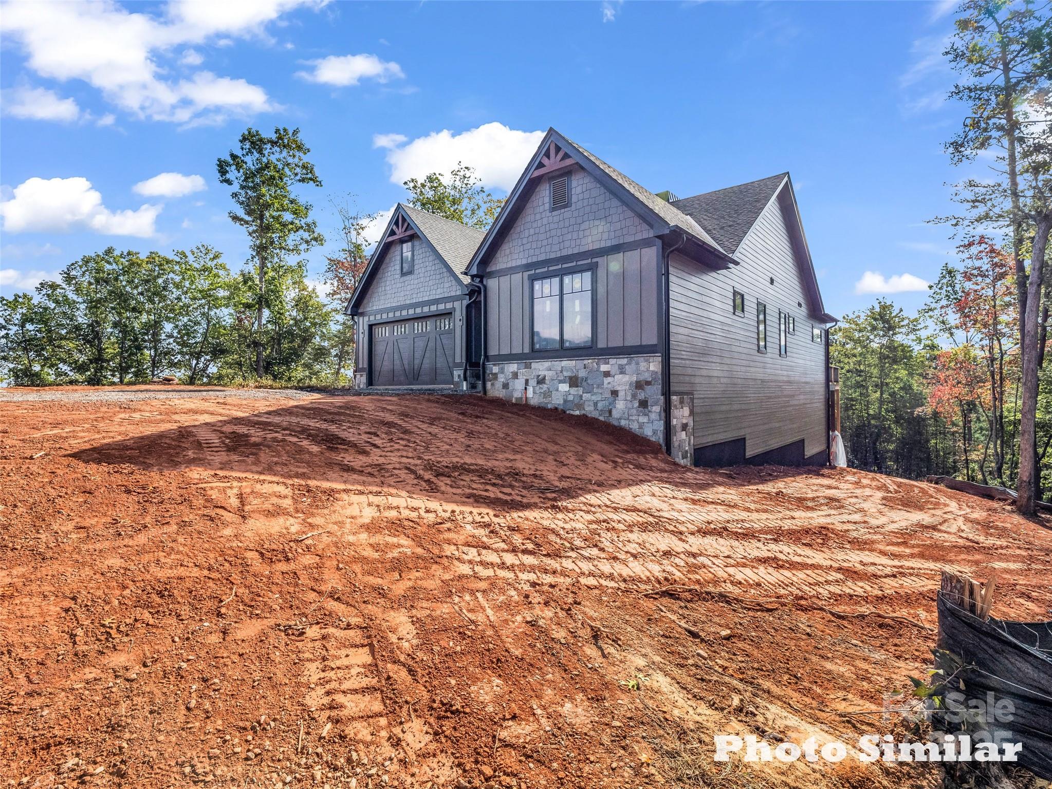 1 Jackson Ridge Ln Mill Spring Mill Spring, NC 28756 - Photo 4 of 36 a view of a house with a yard