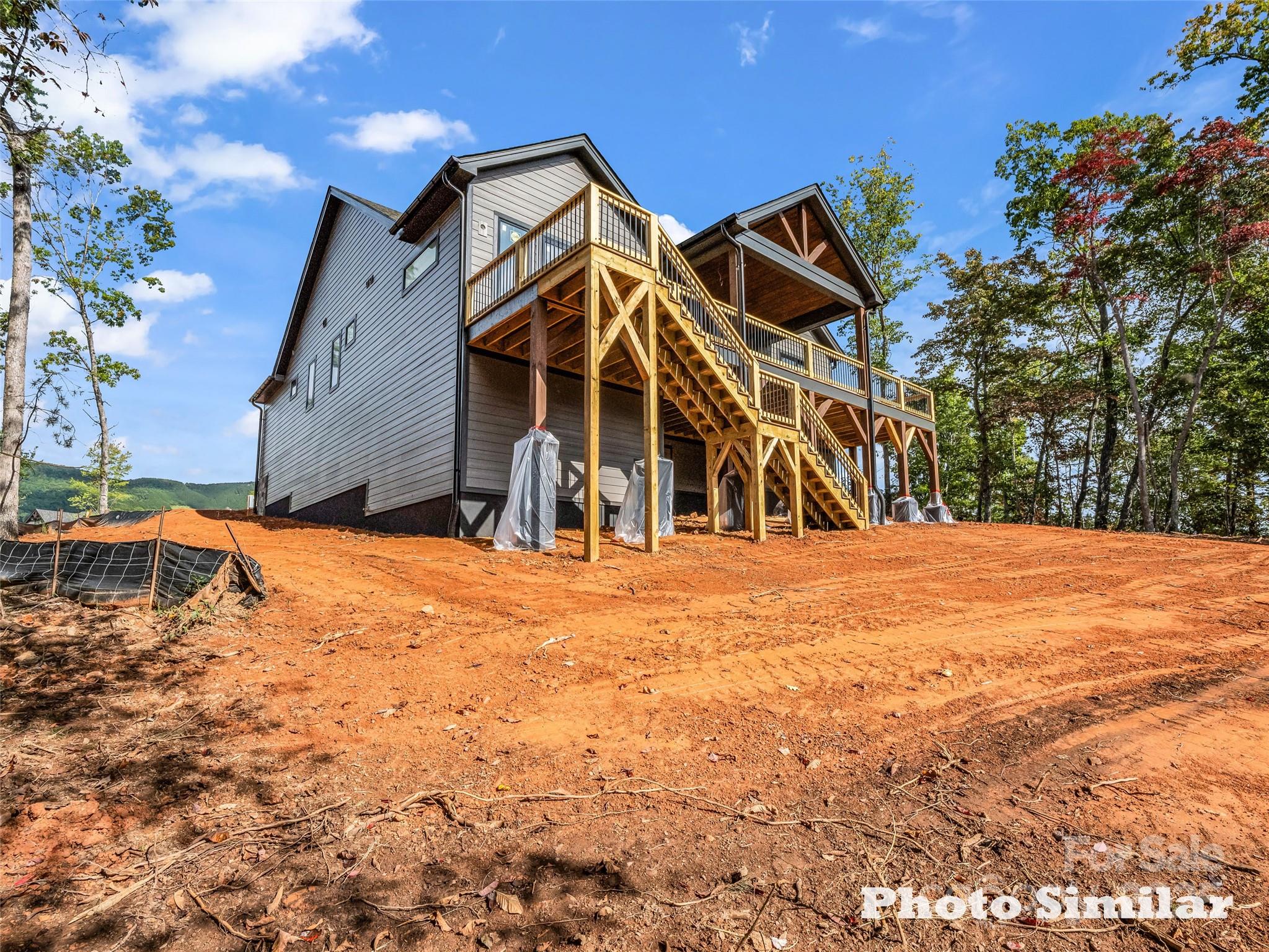 1 Jackson Ridge Ln Mill Spring Mill Spring, NC 28756 - Photo 6 of 36 a view of outdoor space yard and basketball court