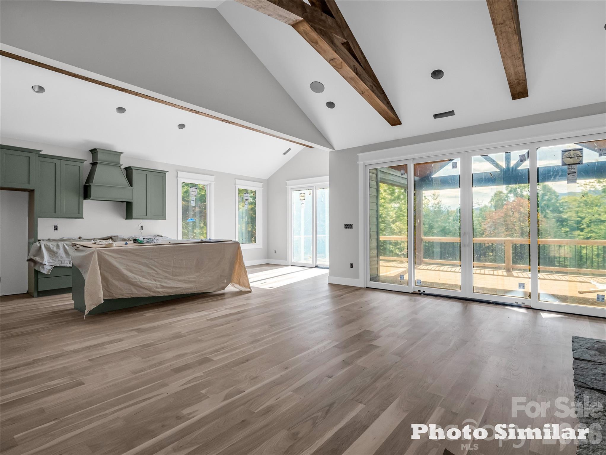 1 Jackson Ridge Ln Mill Spring Mill Spring, NC 28756 - Photo 9 of 43 a bedroom with furniture and large window