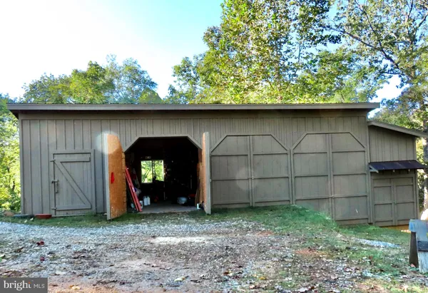 a view of swimming pool with trees