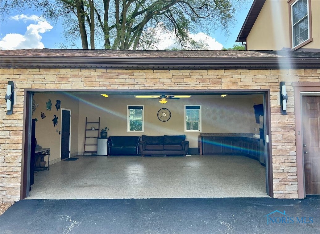 3525 Albon Road Maumee, OH 43537 - Photo 17 of 48 24 X 28 garage with cabinets, garage refrigerator and kegerator included.