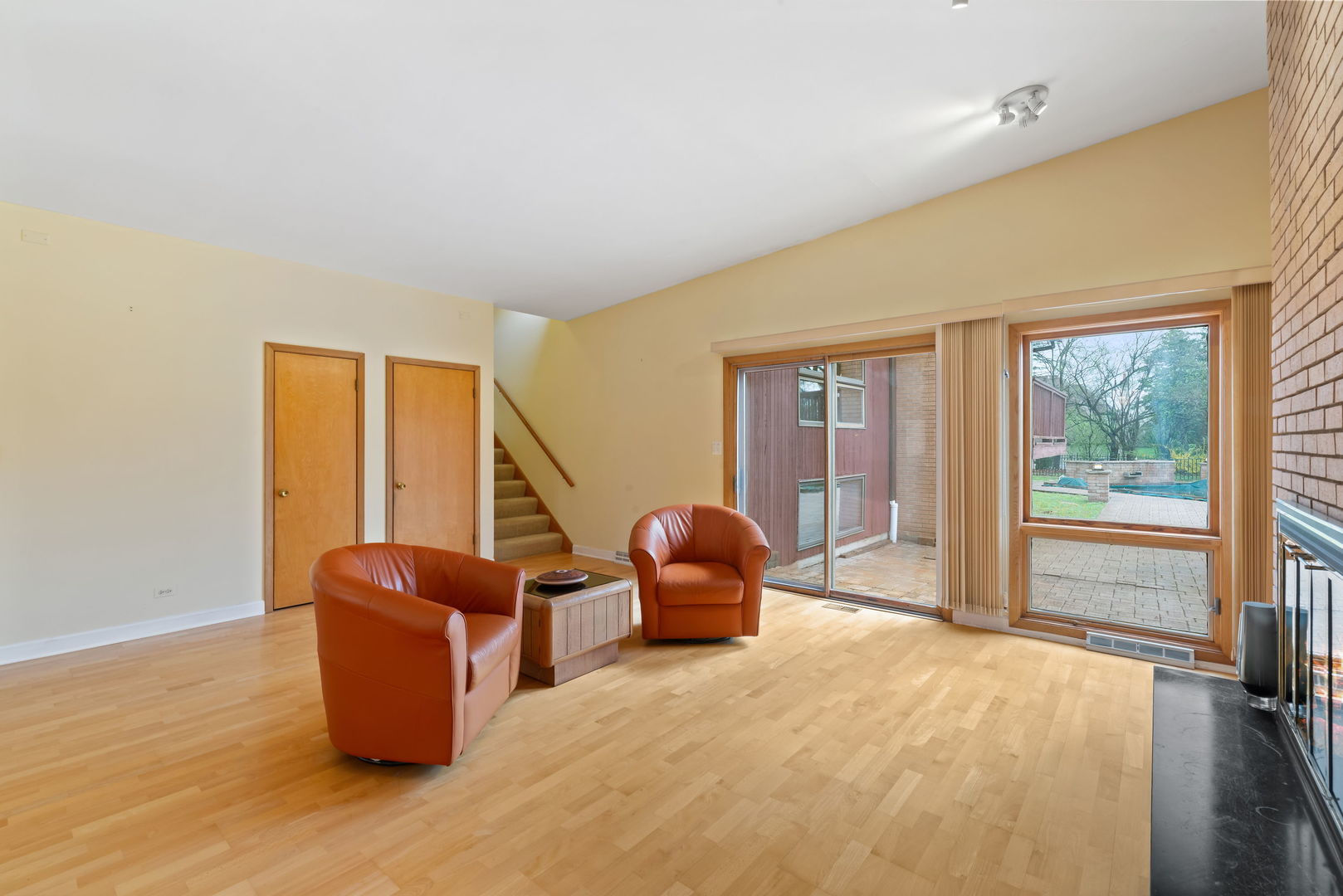 2819 Meyers Road Oak Brook, IL 60523 - Photo 15 of 35 a living room with furniture a floor to ceiling window and wooden floor